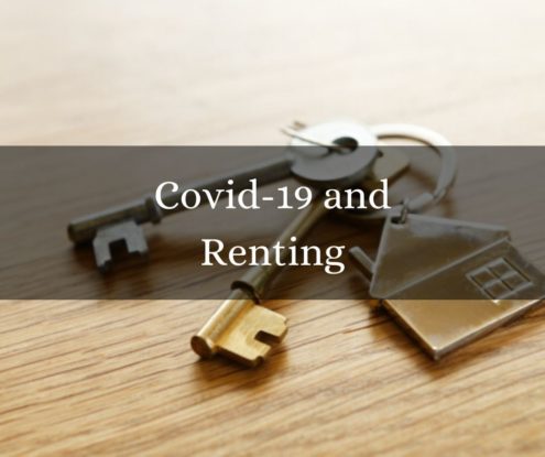 bronze house keys on a table