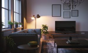 Modern style designed living room interior scene close-up in the winter evening with lamp shining a light