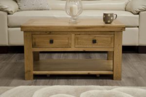wooden coffee table with storage placed in the middle of a living room